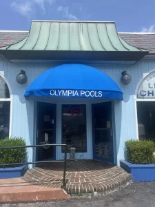 Sunbrella Pacific Blue awnings with glossy white lettering were the winning choice.
